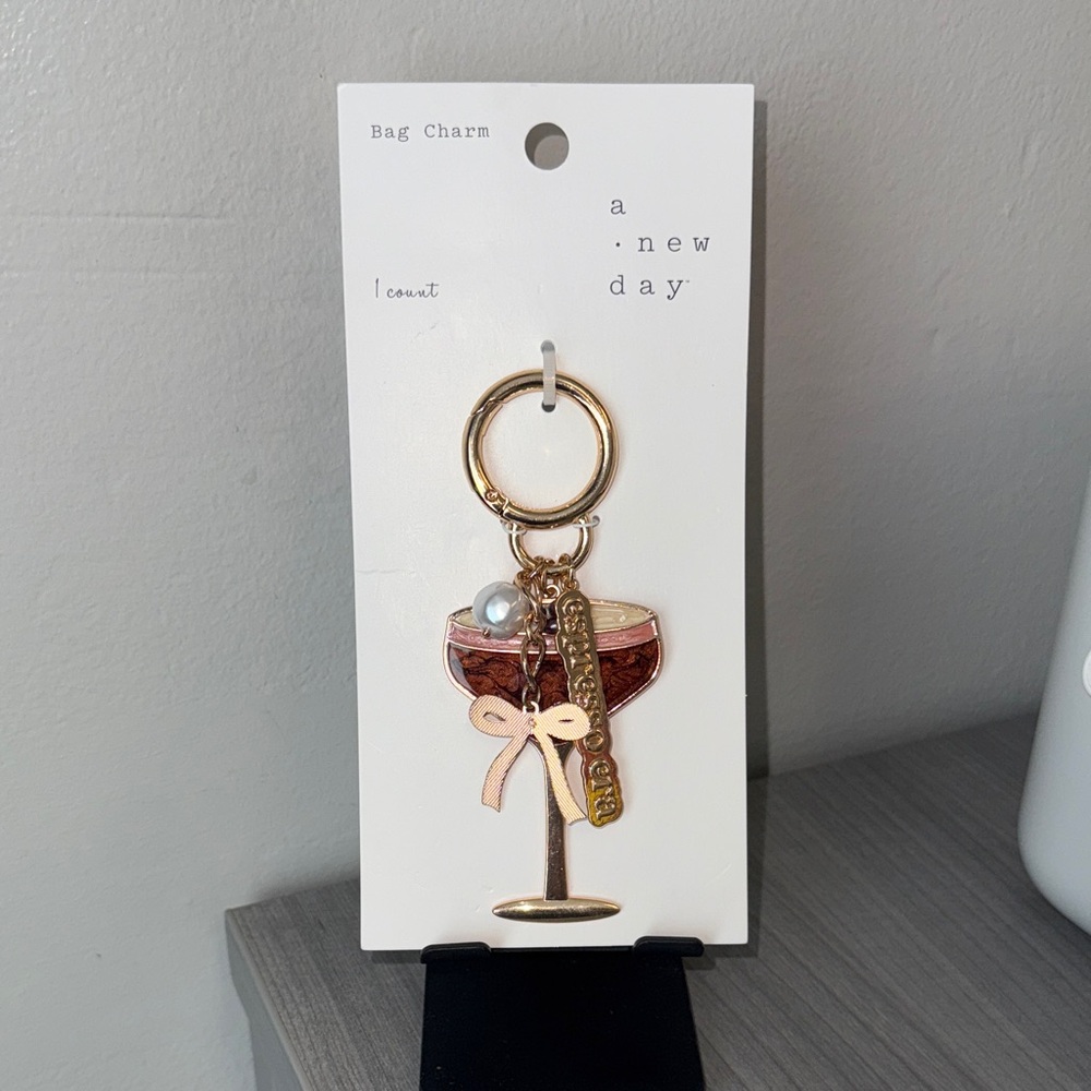 A New Day Gold and Pink Espresso Era Glass Bag Charm